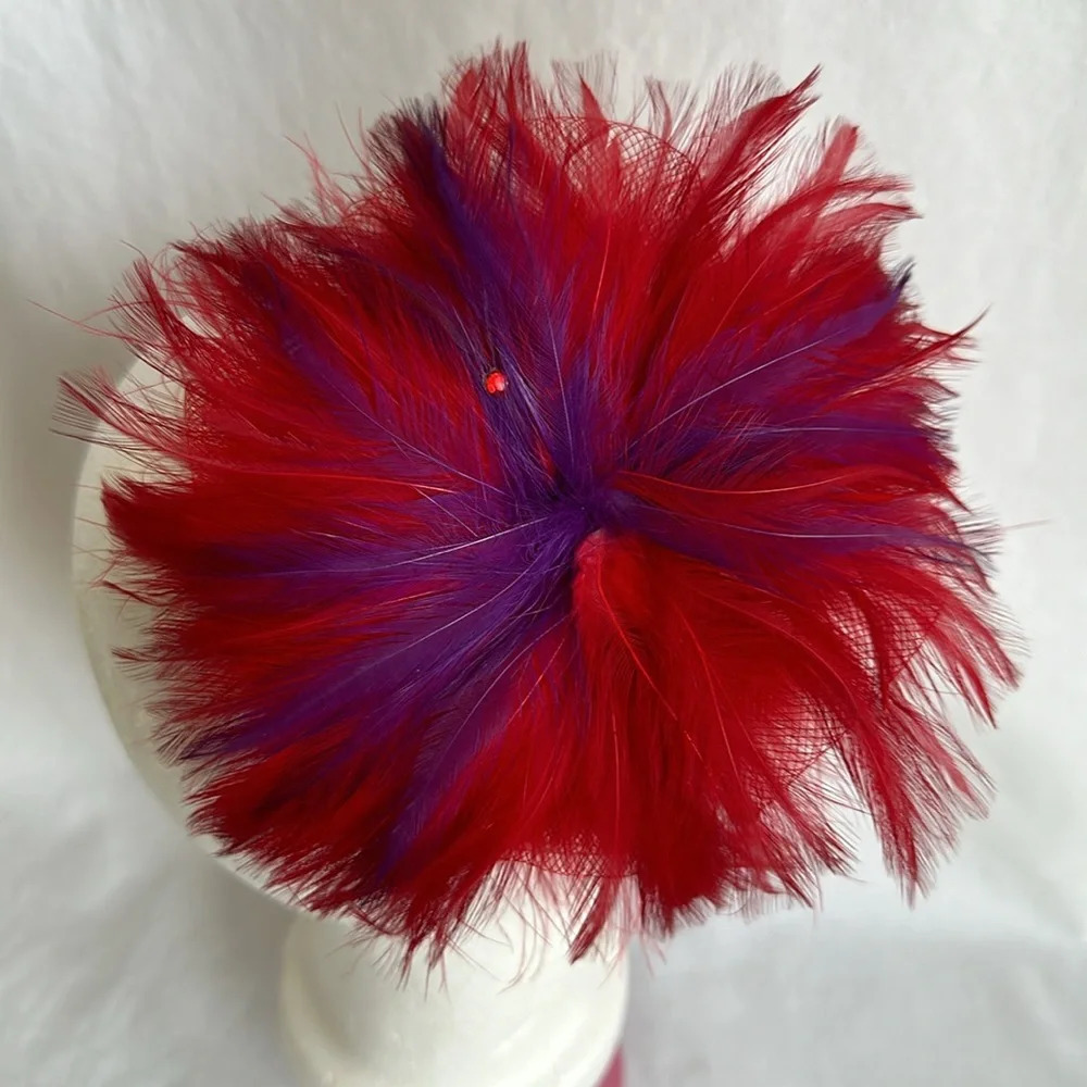 Red and purple feather fascinator